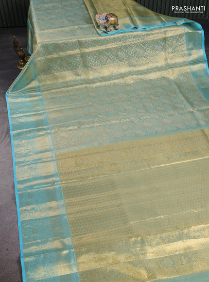 Pure kanchipuram tissue silk saree golden light blue with allover zari woven brocade weaves and rich zari woven border
