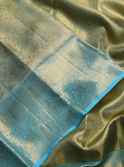Pure kanchipuram tissue silk saree golden light blue with allover zari woven brocade weaves and rich zari woven border