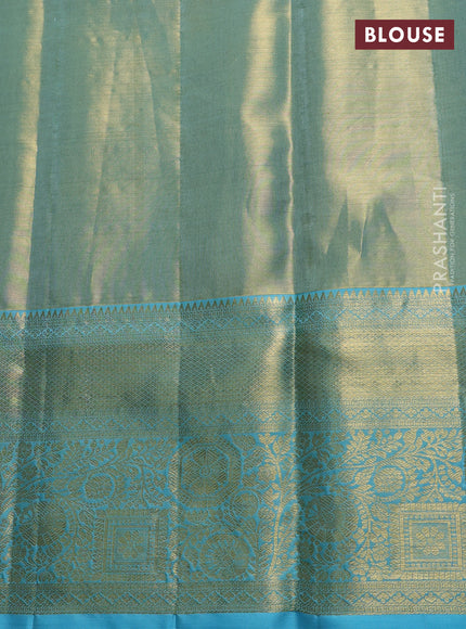 Pure kanchipuram tissue silk saree golden light blue with allover zari woven brocade weaves and rich zari woven border