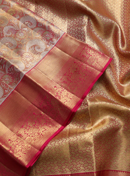 Pure kanchipuram tissue silk saree golden pink and dark pink with allover zari woven brocade weaves and long rich zari woven floral border