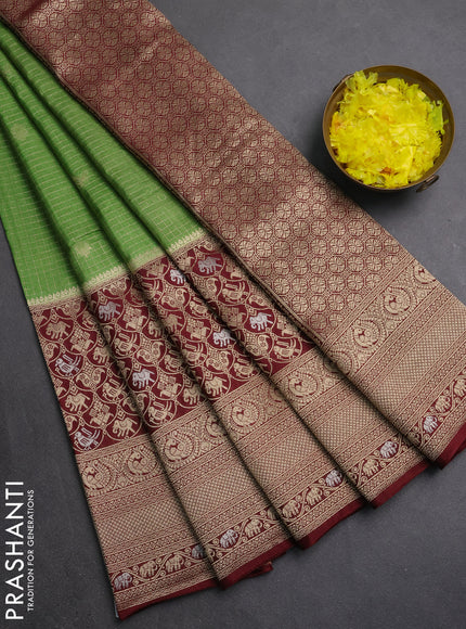 Semi mysore silk saree green and deep maroon with allover small zari checks & buttas and long zari woven border