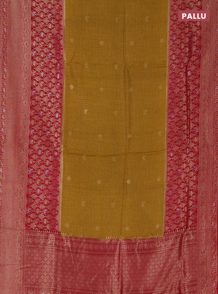 Semi mysore silk saree mustard yellow and pink with allover small zari checks & buttas and long zari woven border