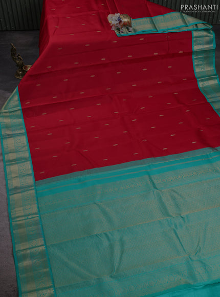 Pure kanchipuram silk saree red and teal green with zari woven buttas and temple design zari woven korvai border