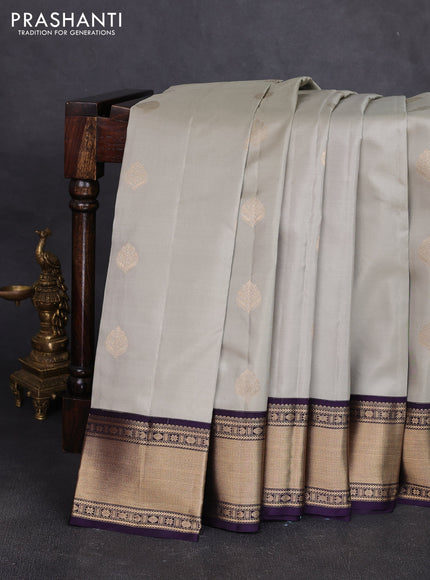 Pure kanchipuram silk saree pastel green and deep jamun with zari woven buttas and zari woven korvai border