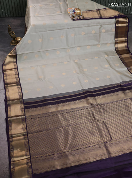 Pure kanchipuram silk saree pastel green and deep jamun with zari woven buttas and zari woven korvai border