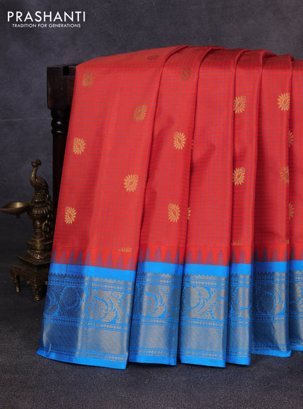 Pure gadwal silk saree orange and teal blue with allover checks & zari buttas and temple design zari woven border
