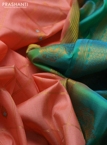Pure gadwal silk saree peach orange and teal blue with allover zari checks & buttas and temple design zari woven border