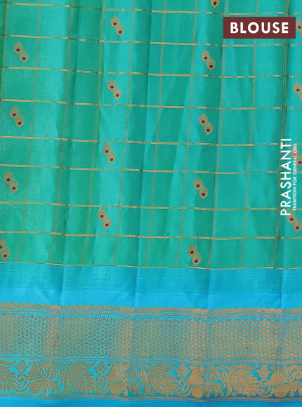 Pure gadwal silk saree peach orange and teal blue with allover zari checks & buttas and temple design zari woven border