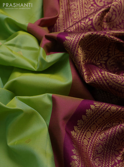 Pure gadwal silk saree pista green and dark magenta with allover zari woven buttas and rich zari woven border