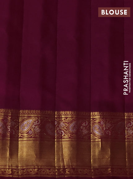 Pure gadwal silk saree pista green and dark magenta with allover zari woven buttas and rich zari woven border