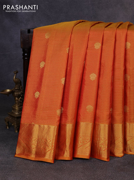 Pure gadwal silk saree sunset orange with allover zari checks & buttas and zari woven border