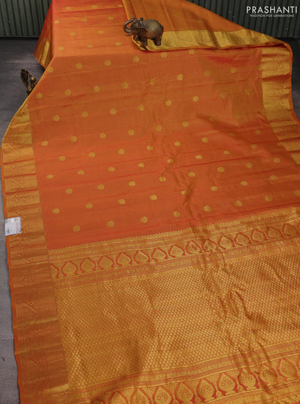 Pure gadwal silk saree sunset orange with allover zari checks & buttas and zari woven border