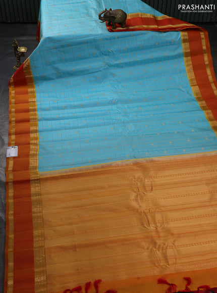 Pure gadwal silk saree teal blue and sunset orange with allover zari checks & buttas and rettapet zari woven border