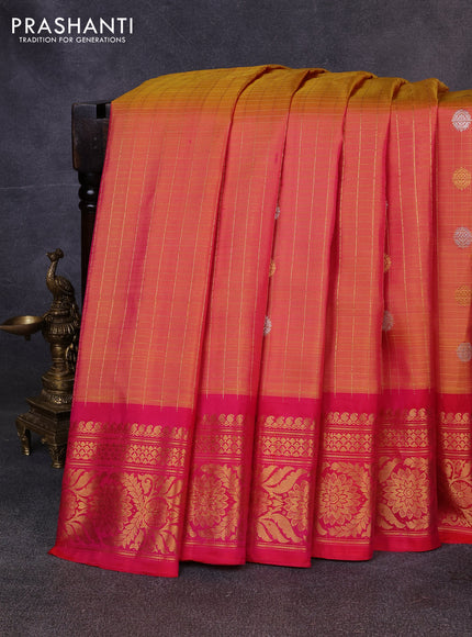 Pure gadwal silk saree dual shade of yellow and dark pink with allover zari checks & buttas and zari woven border