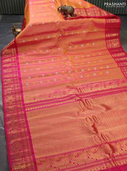 Pure gadwal silk saree dual shade of yellow and dark pink with allover zari checks & buttas and zari woven border