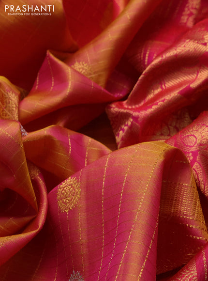 Pure gadwal silk saree dual shade of yellow and dark pink with allover zari checks & buttas and zari woven border