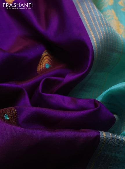 Pure gadwal silk saree purple and teal blue with allover zari woven buttas and temple design zari woven border