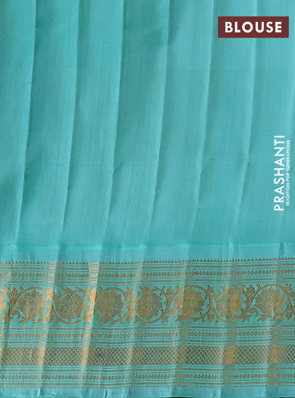 Pure gadwal silk saree purple and teal blue with allover zari woven buttas and temple design zari woven border