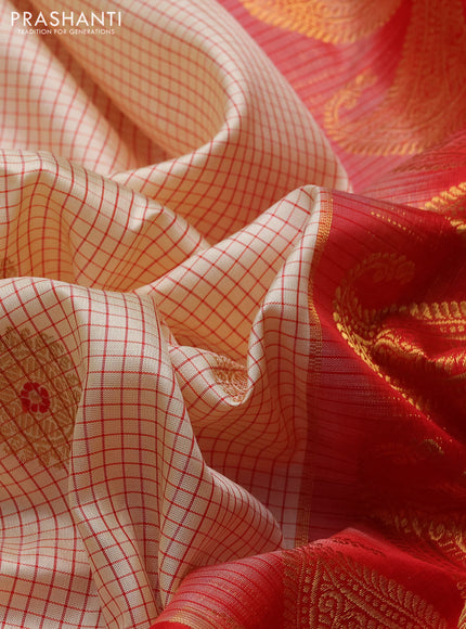 Pure gadwal silk saree cream and red with allover checks & zari woven buttas and ganga jamuna border