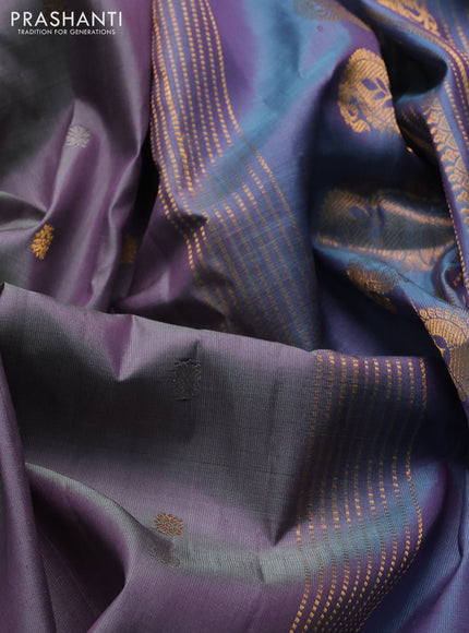Pure gadwal silk saree dual shade of grey and blue shade with allover silver & zari woven buttas and rettapet zari woven border
