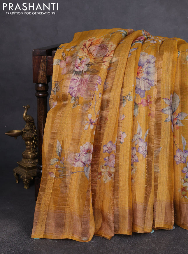 Organza tissue tussar silk saree mustard yellow with allover zari stripe pattern & floral prints and zari woven border