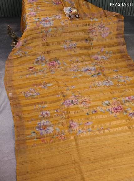 Organza tissue tussar silk saree mustard yellow with allover zari stripe pattern & floral prints and zari woven border