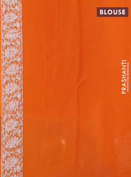 Banarasi chiffon saree orange with allover silver zari woven buttas and silver zari woven floral border