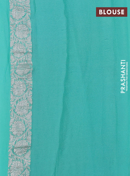 Banarasi chiffon saree peacock green and teal blue with allover silver zari woven buttas and silver zari woven floral border