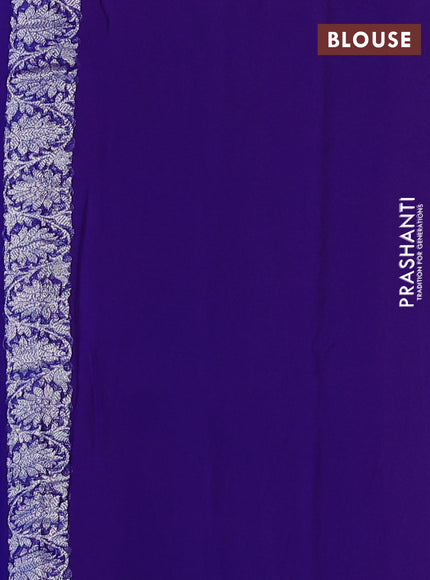 Banarasi chiffon saree peach and royal blue with allover silver zari woven buttas and silver zari woven floral border