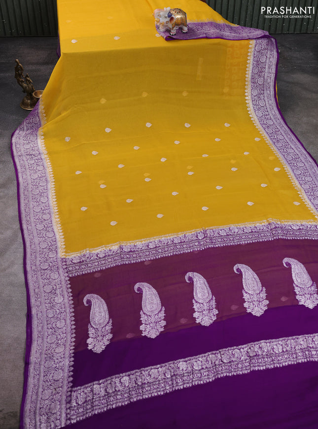 Banarasi chiffon saree yellow and purple with allover silver zari woven buttas and silver zari woven floral border