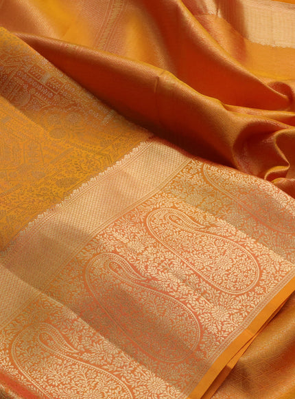 Pure kanchipuram silk saree mango yellow with allover zari woven brocade weaves and long rich zari woven border