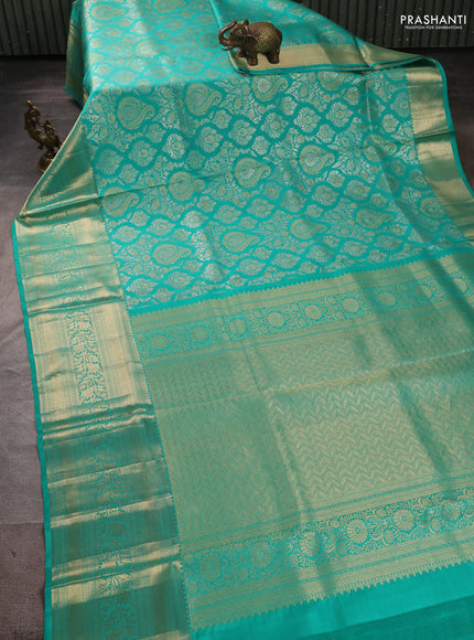 Pure kanchipuram silk saree teal green with allover zari woven brocade weaves and long rich zari woven border