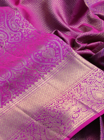 Pure kanchipuram silk saree magenta pink with allover zari woven brocade weaves and long rich zari woven border