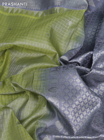 Venkatagiri silk saree pista green and grey with allover silver zari checks & buttas and temple silver zari woven border
