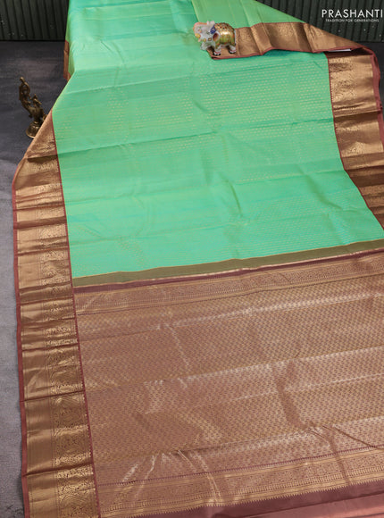 Pure kanchipuram silk saree teal green and dark sandal with allover weaves & zari woven 1000 buttas and zari woven border