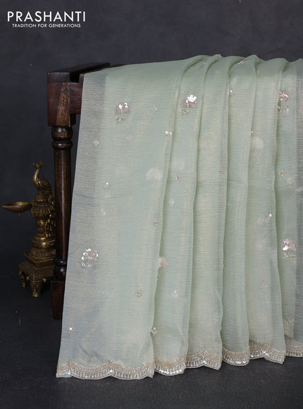Crush tissue saree pista green with sequin embroidery buttas and sequin embroidery pallu & border