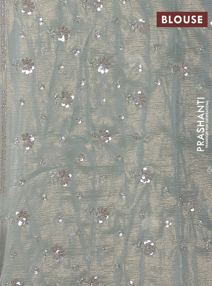 Crush tissue saree pista green with sequin embroidery buttas and sequin embroidery pallu & border