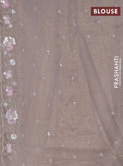 Crush tissue saree beige with sequin embroidery buttas and floral sequin embroidery pallu & border