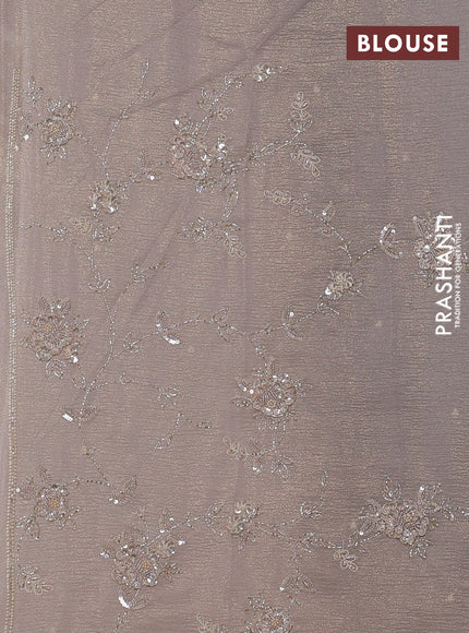 Crush tissue saree beige with beaded work buttas and sequin embroidery pallu & border