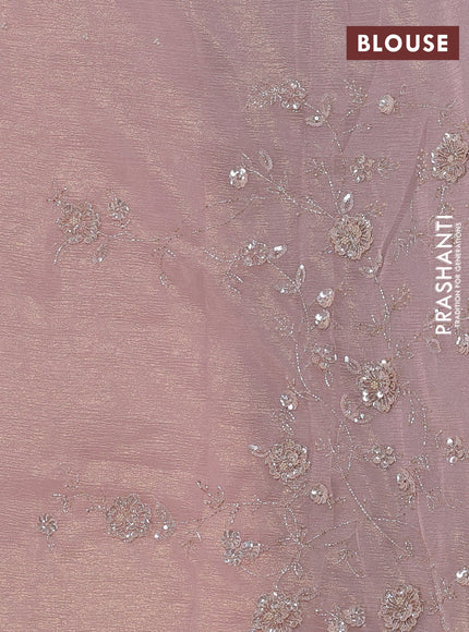 Crush tissue saree mild peach with beaded work buttas and sequin embroidery pallu & border