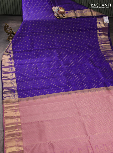 Pure kanchipuram silk saree blue and mauve pink with allover zari woven buttas and zari woven korvai border
