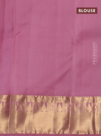 Pure kanchipuram silk saree blue and mauve pink with allover zari woven buttas and zari woven korvai border