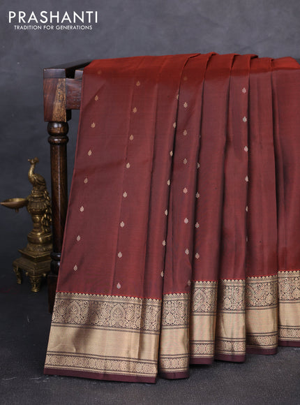 Pure kanchipuram silk saree rust shade and coffee brown with allover zari woven buttas and zari woven korvai border