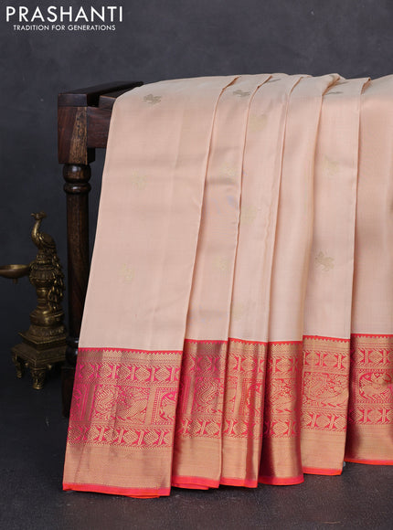 Pure kanchipuram silk saree cream and orange with zari woven buttas and zari woven korvai border