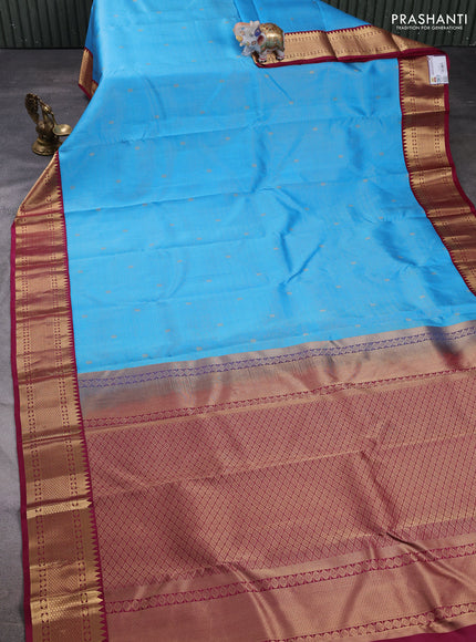 Pure kanchipuram silk saree teal blue and wine shade with allover small zari checks & buttas and zari woven border