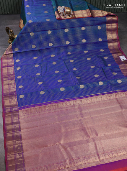 Pure kanchipuram silk saree dual shade of bluish green and orange shade with allover zari checks & buttas and zari woven border