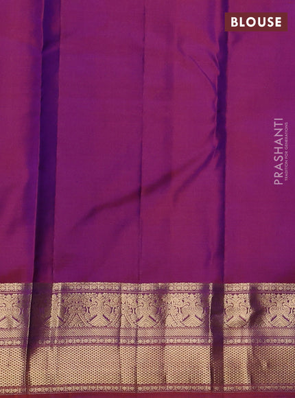 Pure kanchipuram silk saree dual shade of bluish green and orange shade with allover zari checks & buttas and zari woven border