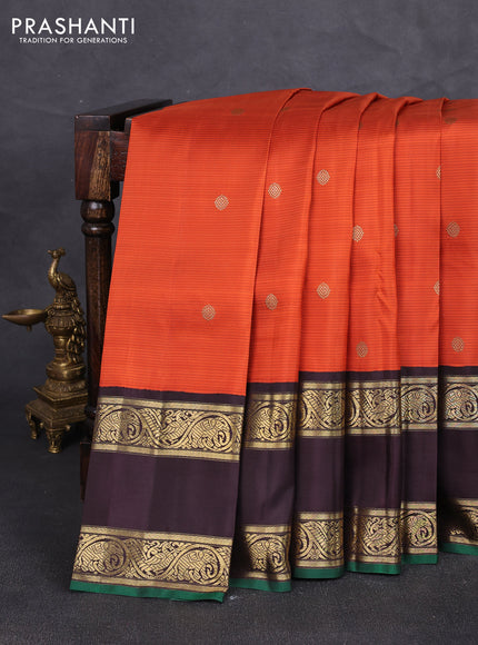 Pure kanchipuram silk saree orange and coffee brown with allover stripe pattern & zari buttas and long rettapet zari woven border