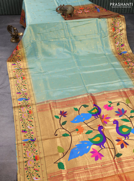 Tissue silk saree teal blue with allover zari woven buttas and paithani pallu & border