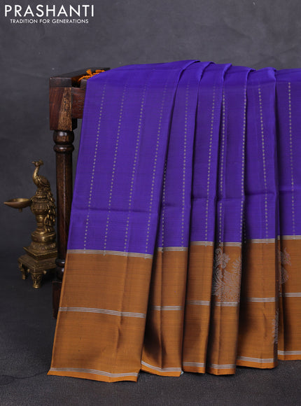 Kanchipuram soft silk saree blue and mustard yellow with allover silver zari weaves and long zari woven butta border
